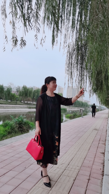 周本玲的第一张照片--苏州相亲服务中心